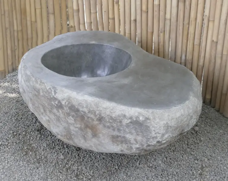 Product image 3 of the product “Stone fire pit, made from Riverstone. Size about 120 x 80 x 40cm Height and the hole size is 51cm diameter and 28cm height ”